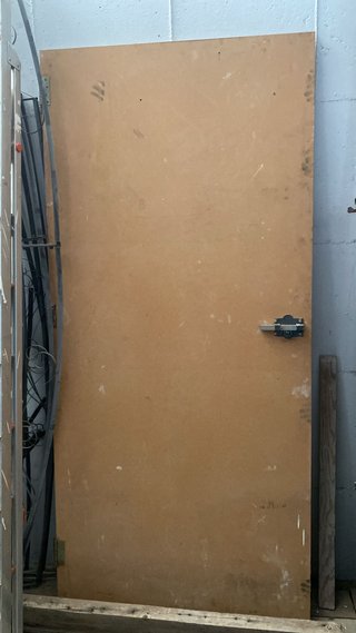 Puerta aglomerado con cerradura