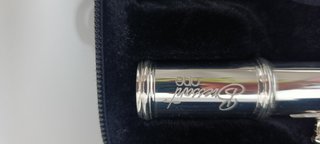 Flauta travesera con estuche y libro