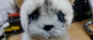 Peluche gato blanco y marrón
