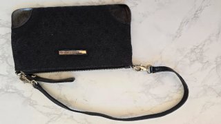 Pochette Coccinelle nera con inserti in pelle