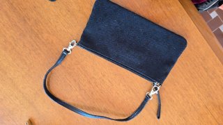 Pochette Coccinelle nera con inserti in pelle