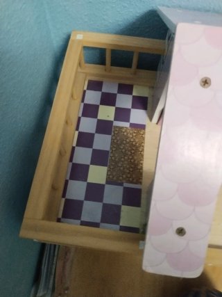 Casa de muñecas de madera