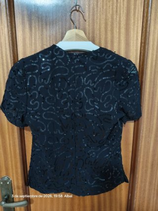 Top negro lentejuelas