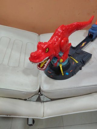 Juguete Dinosaurio Rojo con Pista