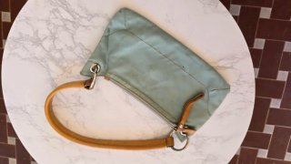 Pochette Coccinelle tessuto tecnico turchese