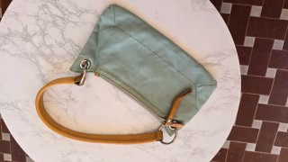 Pochette Coccinelle tessuto tecnico turchese