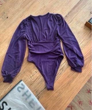 Body morado manga larga. T.S
