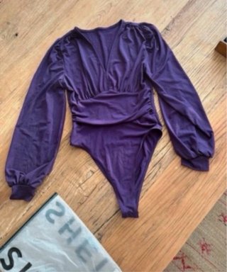 Body morado manga larga. T.S