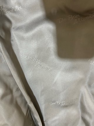 Pelliccia vintage beige e grigia