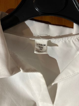 Completo pantalone rosa camicia bianca
