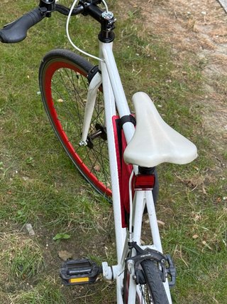Bicicleta Fixie Blanca con Ruedas Rojas