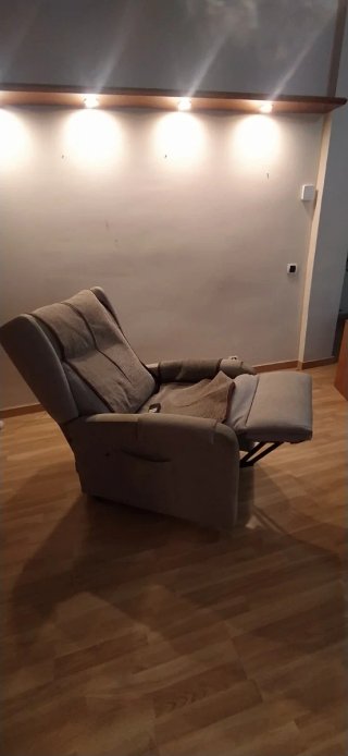 Butaca reclinable elèctrica tela con mando