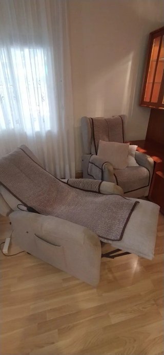 Butaca reclinable elèctrica tela con mando