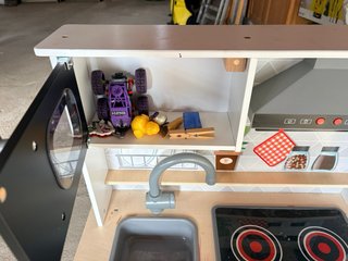 Cocinita de madera nueva, apenas de ha usado.