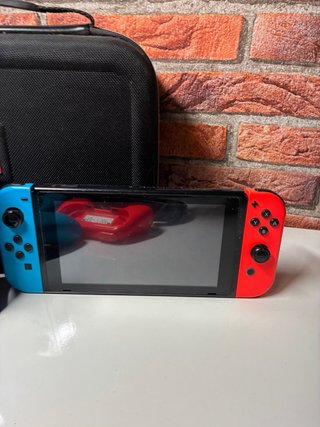 Nintendo Switch + Juegos y Accesorios