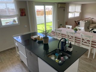 Cocina completa + gran isla + Dekton + electrodomé