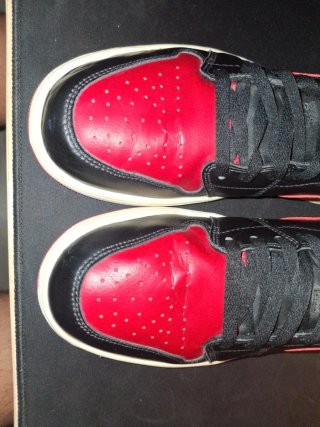 Jordan 1 Low Negro y Rojo
