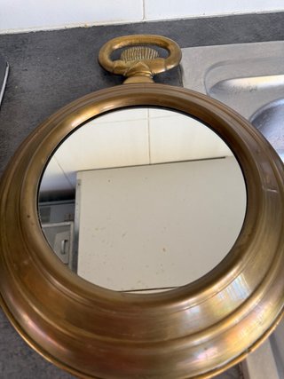 Espejo decorativo forma reloj dorado