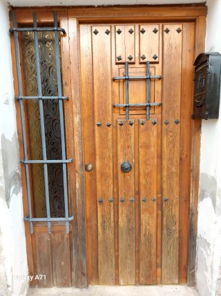Puerta exterior madera con cristal