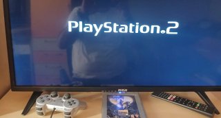 Playstation 2 con joystick e memory card