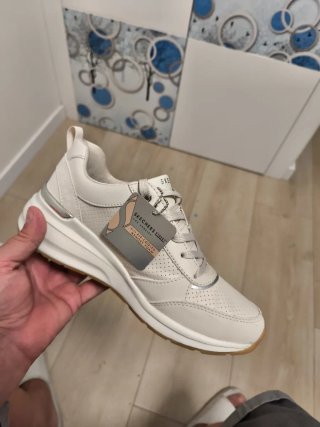 Botín Skechers Mujer Blanco y Plateado