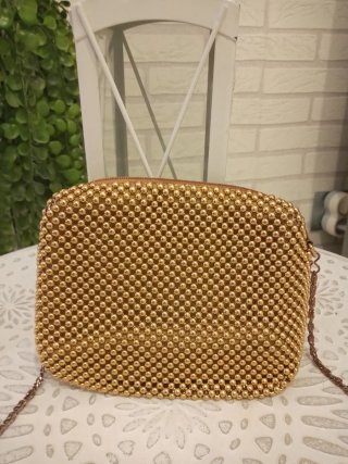 Bolso fiesta dorado con cadena