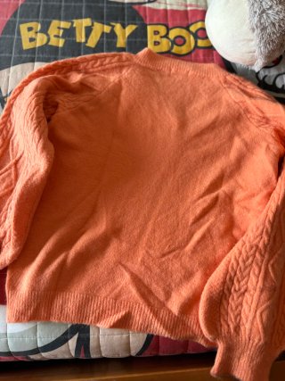Jersey coral de punto con trenzado