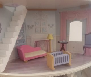Casa de muñecas de madera