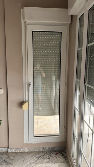 Puerta doble de cristal