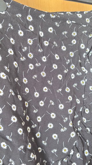 Falda short flores margaritas