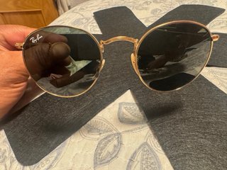 Gafas de sol Ray-Ban doradas y marrones