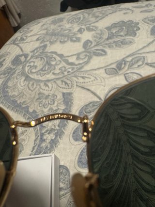 Gafas de sol Ray-Ban doradas y marrones