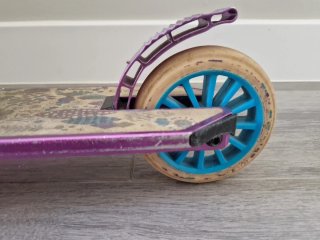 Patinete scooter ajustable Oxelo MID5 morado