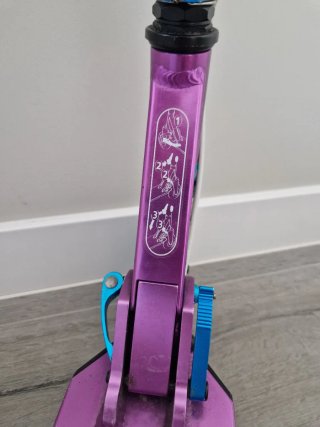 Patinete scooter ajustable Oxelo MID5 morado