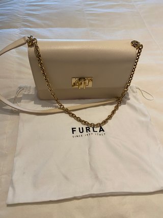 Bolso clutch blanco marca Furla de piel