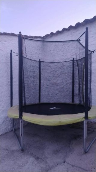 Cama elástica con red de seguridad