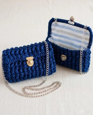 Bolso de fiesta artesanal azul y dorado