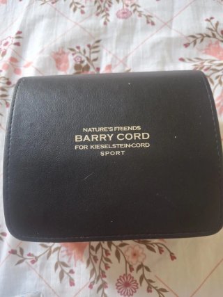 Orologio con cinturino nero e quadrante argento