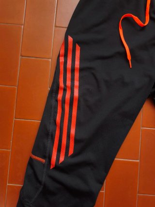 Pantaloni 3/4 Adidas supernova neri e arancioni L