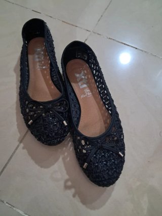 Zapatos planos negros de malla
