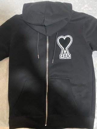 Sudadera AMI Paris con cremallera y capucha