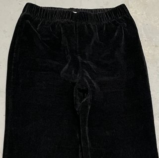 Pantalones negros acampanados de terciopelo