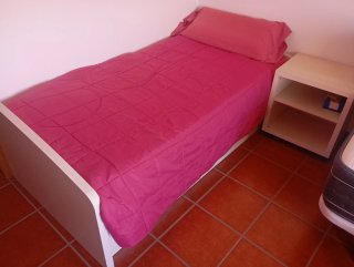 Cama nido doble blanca con frontal rosa