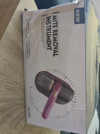 Aspirador de pelusas portátil