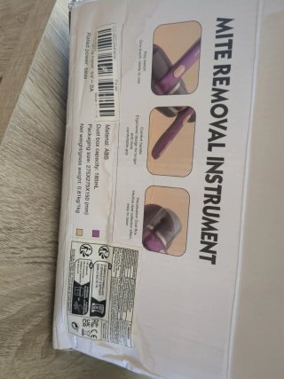 Aspirador de pelusas portátil