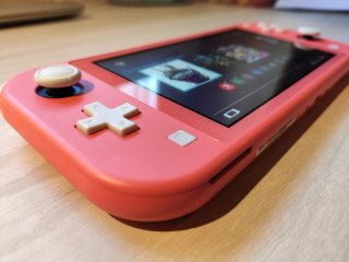 Nintendo Switch Lite Corallo + Custodia
