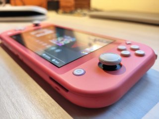 Nintendo Switch Lite Corallo + Custodia