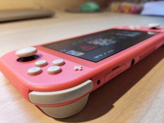 Nintendo Switch Lite Corallo + Custodia