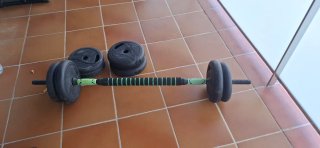 Barra de pesas con 6 discos
