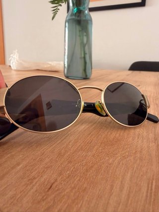 Gafas de sol Arnette doradas y negras